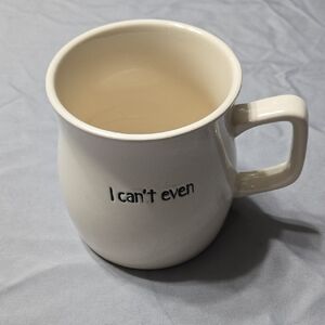 Cost Plus World Market Cream Mug with Black Text